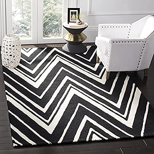 SAFAVIEH Modern Teppich für Wohnzimmer, Esszimmer, Schlafzimmer - Cambridge Collection, Kurzer Flor, Schwarz und Elfenbein, 152 X 244 cm